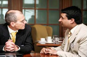 Waqas talking to a client